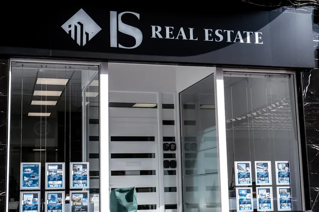 IS Real Estate Office Front Torrevieja city 2024-11-05. Property creators rules and ethics in England